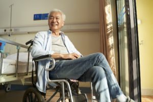 New Jersey Nursing Home Physical Abuse Lawyers - senior asian man sitting in wheel chair in nursing home